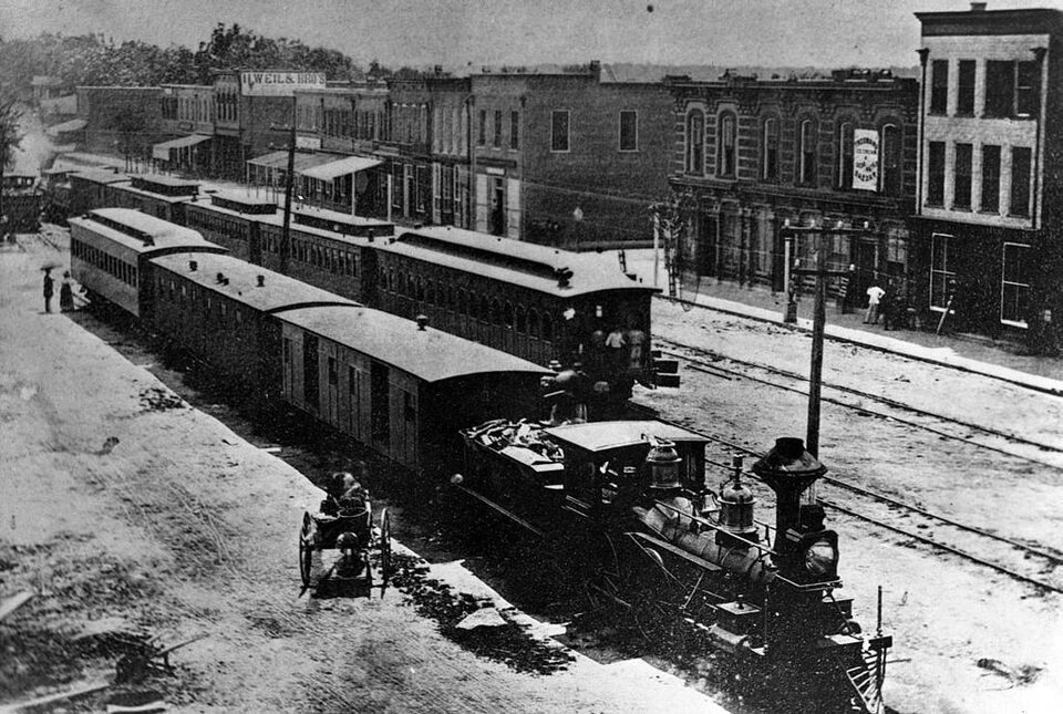 A steam train at the station in Goldsboro around 1870. Image from the State Archives of North Carolina.