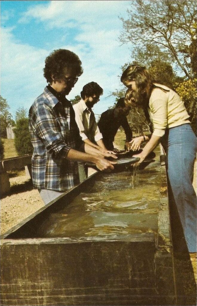  Panning for gold at the Reed Gold mine in a vintage postcard featuring some pretty haunting fashions. From the author's collection.