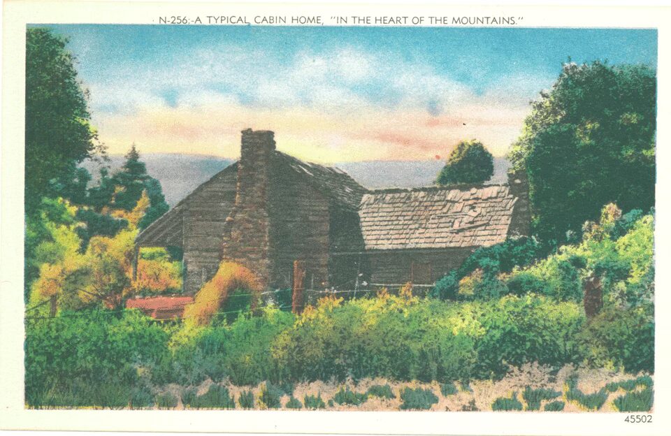 A vintage postcard of a "Typical Cabin Home" in the Appalachians.